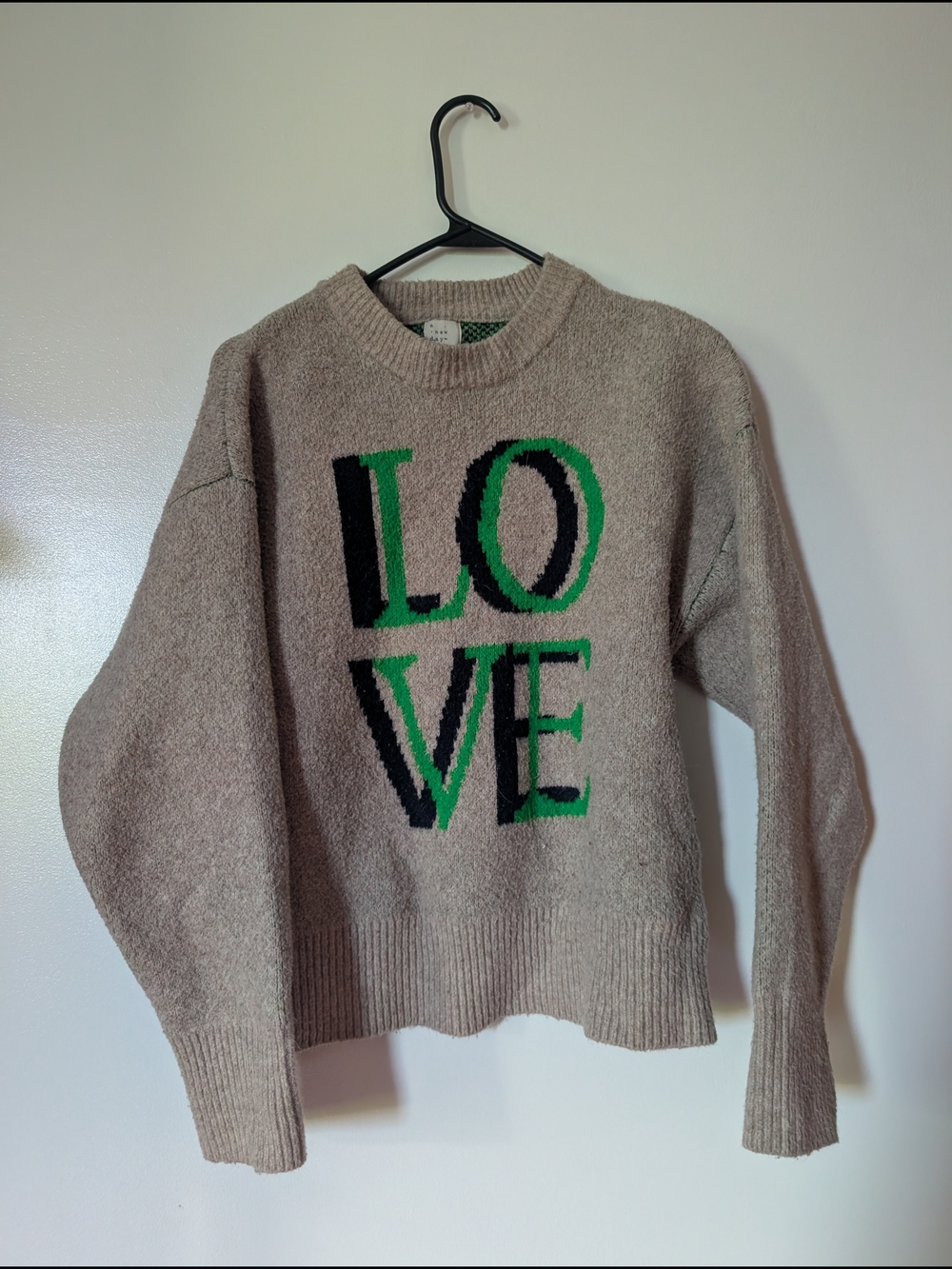 a new day Taupe Crewneck Sweater with Green and Black LOVE Graphic